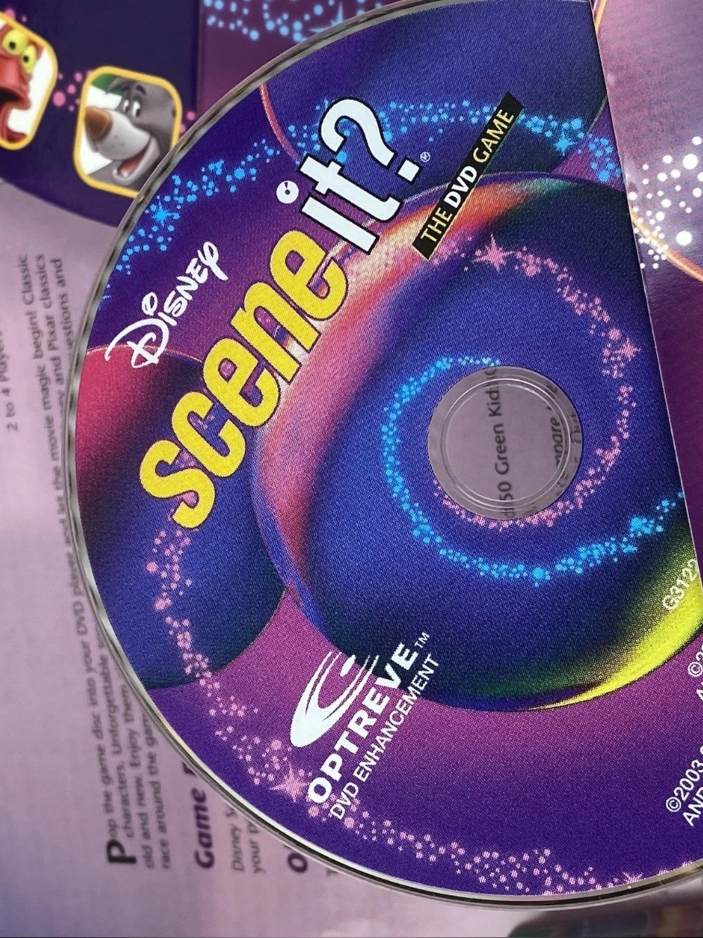 Disney Spin It? DVD Game — Purple and Yellow Box with Colorful Character Art - Picture 9 of 9